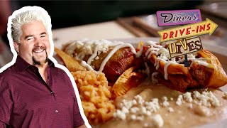 Guy Fieri Eats Pork Tamales  Diners DriveIns and Dives  Food Network [upl. by Arammat]