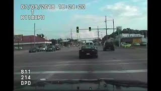 Dashcam Video Decatur Police Car TBones Pickup That Ran Red Light [upl. by Nnire]