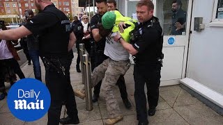 Sacked tesco security guard is taken away by police amid protests  Daily Mail [upl. by Angadresma]