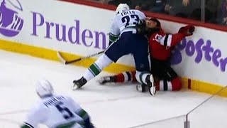 Canucks’ Alex Edler drills Devils rookie Nico Hischier from behind [upl. by Adnuhsor47]