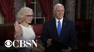 Kyrsten Sinema takes oath as senator on copy of constitution [upl. by Elvia]