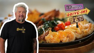 Guy Fieri Eats a Cheesy Shrimp Hot Plate  Diners DriveIns and Dives  Food Network [upl. by Acirehs]